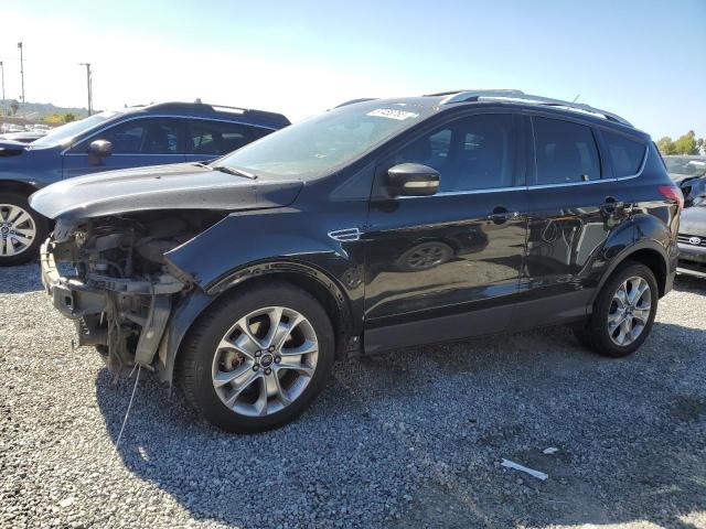 FORD ESCAPE TIT 2014 with VIN 1FMCU9J93EUB98667 - Photo from auction