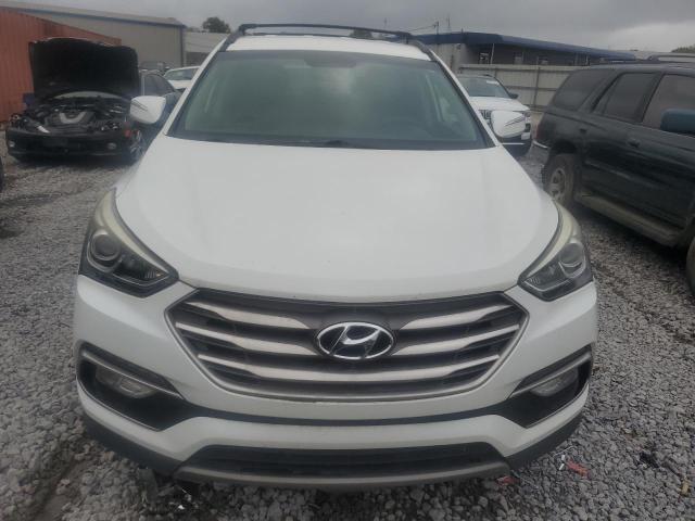 Photo 5 from auction – 2017 HYUNDAI SANTA FE S with VIN 5NMZU3LB4HH014599