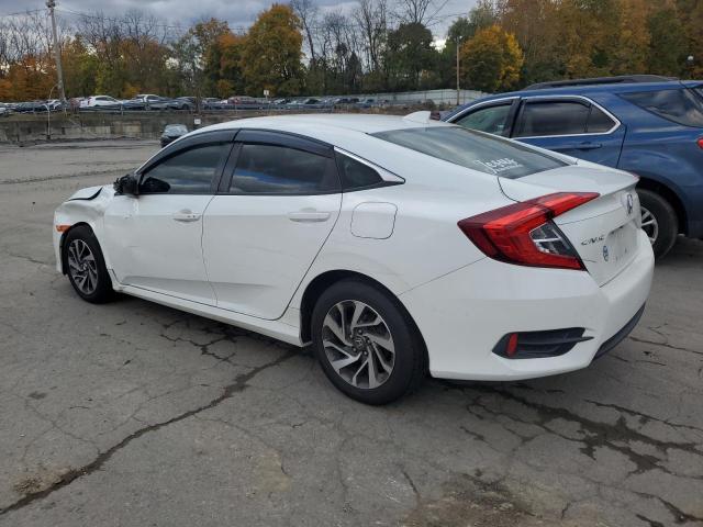 Photo 2 from auction – 2018 HONDA CIVIC EX with VIN 2HGFC2F77JH564874