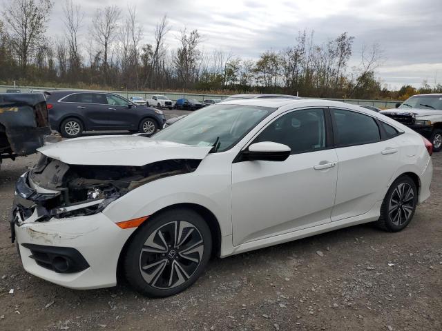 Photo 1 from auction – 2018 HONDA CIVIC EX with VIN 19XFC1F32JE201786