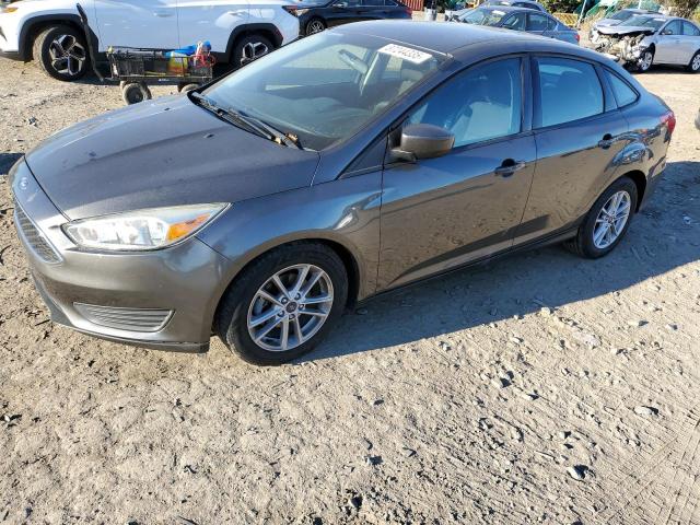 FORD FOCUS SE 2018 with VIN 1FADP3FE6JL307017 - Photo from auction
