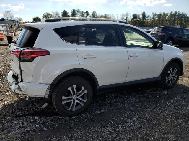 Photo 3 from auction – 2017 TOYOTA RAV4 LE with VIN JTMBFREV7HJ121680