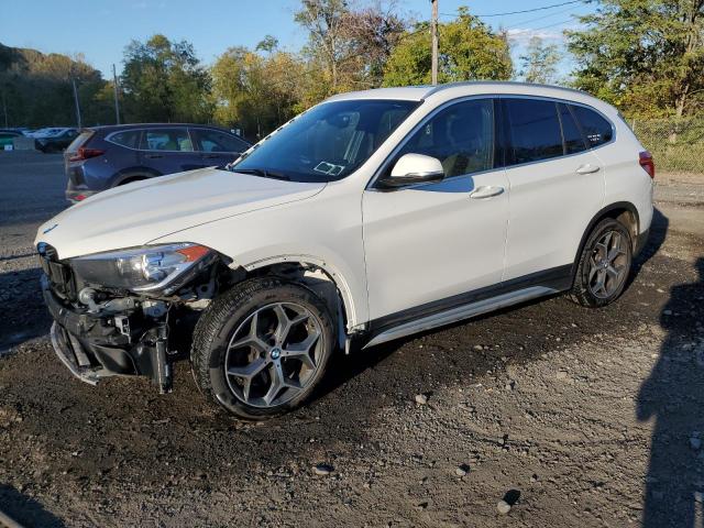 BMW X1 XDRIVE2 2018 with VIN WBXHT3C30J5L30973 - Photo from auction
