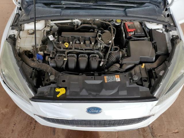 Photo 11 from auction – 2015 FORD FOCUS SE with VIN 1FADP3F21FL329830