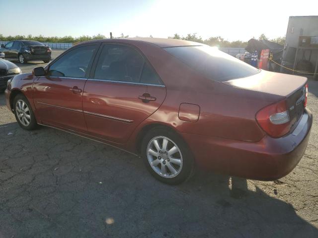 Photo 2 from auction – 2002 TOYOTA CAMRY LE with VIN JTDBE32KX20109403