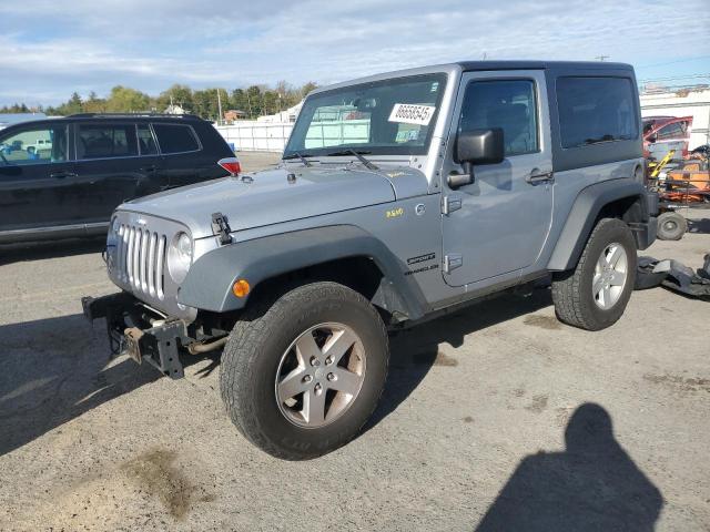 JEEP WRANGLER S 2015 with VIN 1C4AJWAG6FL559608 - Photo from auction