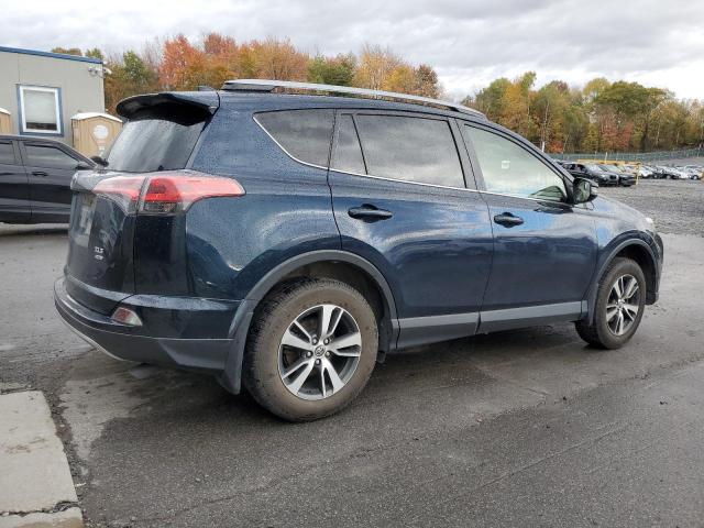 Photo 3 from auction – 2017 TOYOTA RAV4 XLE with VIN JTMRFREV9HJ706565