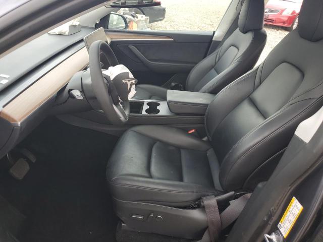 Photo 7 from auction – 2023 TESLA MODEL Y with VIN 7SAYGAEE4PF962275