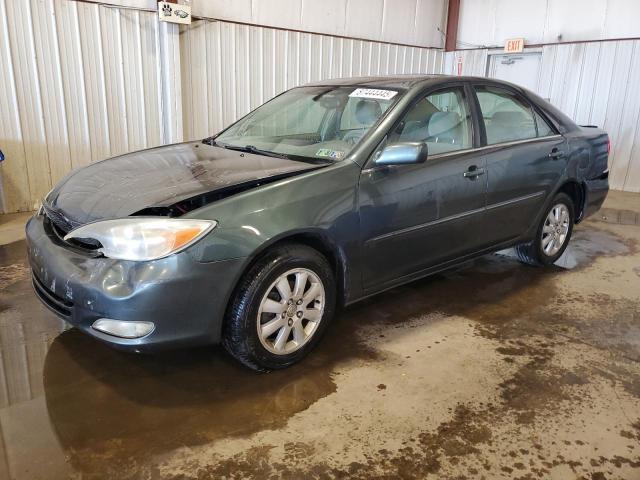 TOYOTA CAMRY LE 2003 with VIN 4T1BE30K43U704577 - Photo from auction