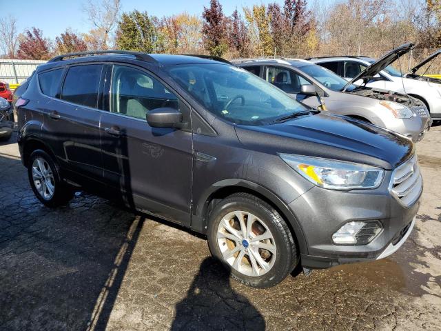 Photo 4 from auction – 2018 FORD ESCAPE SE with VIN 1FMCU0GD2JUC57306