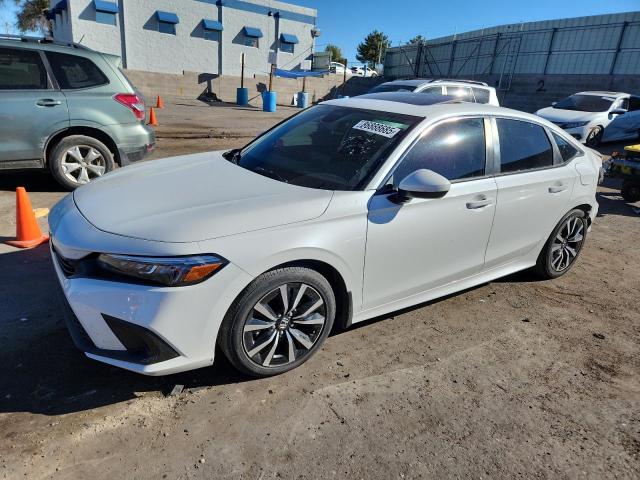 HONDA CIVIC EX 2022 with VIN 2HGFE1F70NH323362 - Photo from auction