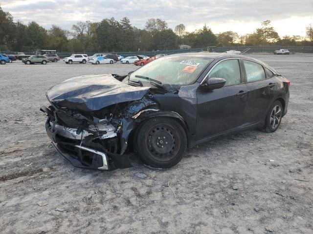 HONDA CIVIC LX 2020 with VIN 19XFC2F62LE029066 - Photo from auction