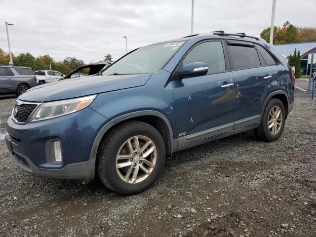 KIA SORENTO LX 2014 with VIN 5XYKTDA64EG517040 - Photo from auction
