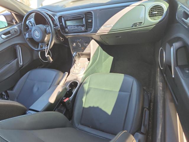 Photo 8 from auction – 2014 VOLKSWAGEN BEETLE with VIN 3VWJP7AT3EM631697