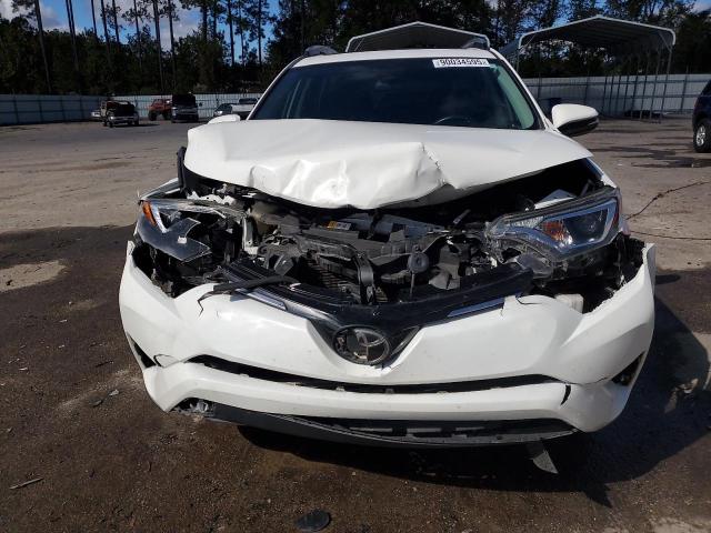 Photo 5 from auction – 2017 TOYOTA RAV4 XLE with VIN JTMWFREV3HJ147680