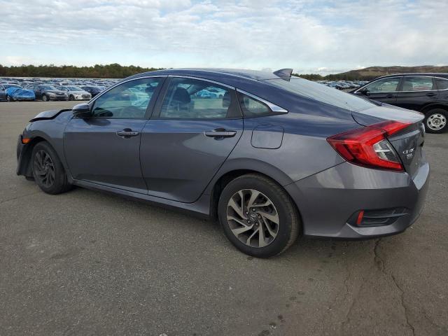 Photo 2 from auction – 2018 HONDA CIVIC EX with VIN 2HGFC2F79JH583717