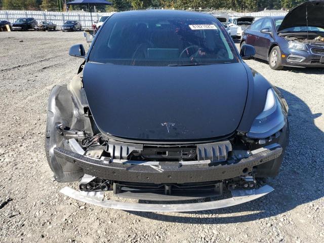 Photo 5 from auction – 2021 TESLA MODEL 3 with VIN 5YJ3E1EA9MF097261
