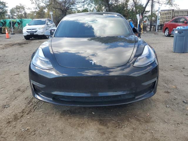 Photo 5 from auction – 2021 TESLA MODEL 3 with VIN 5YJ3E1EBXMF053438