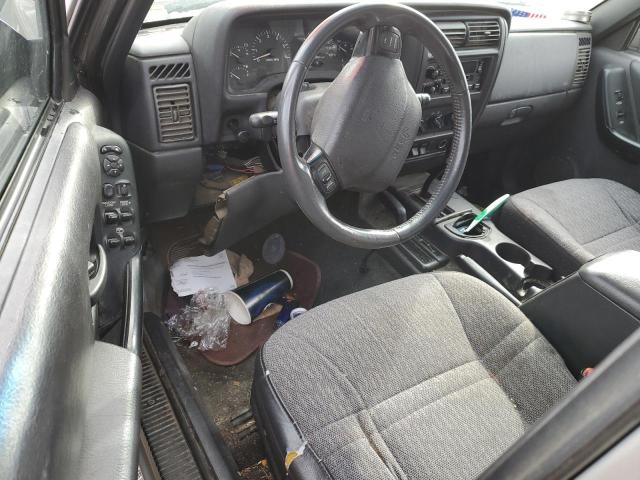 Photo 8 from auction – 2000 JEEP CHEROKEE SPORT with VIN 1J4FF48S2YL262158