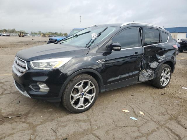 FORD ESCAPE TIT 2017 with VIN 1FMCU9J9XHUB01565 - Photo from auction