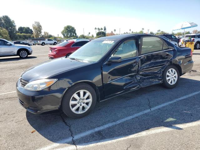 TOYOTA CAMRY LE 2002 with VIN 4T1BF32K02U030730 - Photo from auction