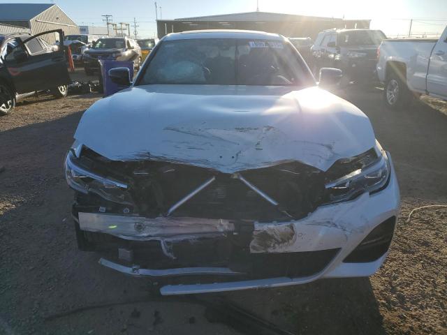Photo 5 from auction – 2021 BMW 330XE with VIN 3MW5P9J04M8C14048