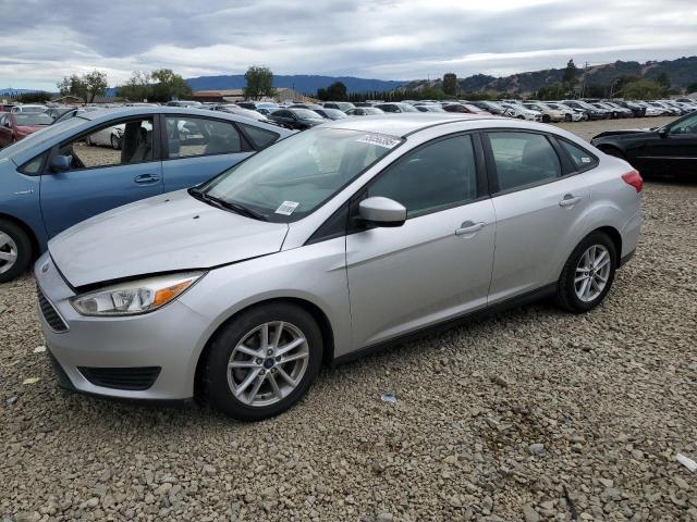 FORD FOCUS SE 2018 with VIN 1FADP3FE1JL313582 - Photo from auction