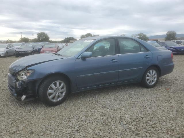 TOYOTA CAMRY LE 2002 with VIN JTDBE30K320042470 - Photo from auction