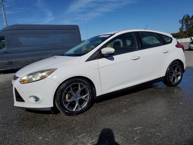 FORD FOCUS SE 2014 with VIN 1FADP3K21EL337513 - Photo from auction