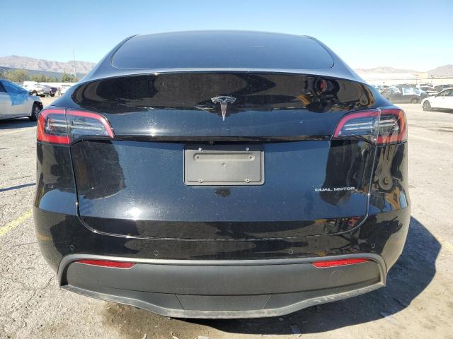 Снимка 6 от търг – 2022 TESLA MODEL Y с VIN 7SAYGDEE1NF363526