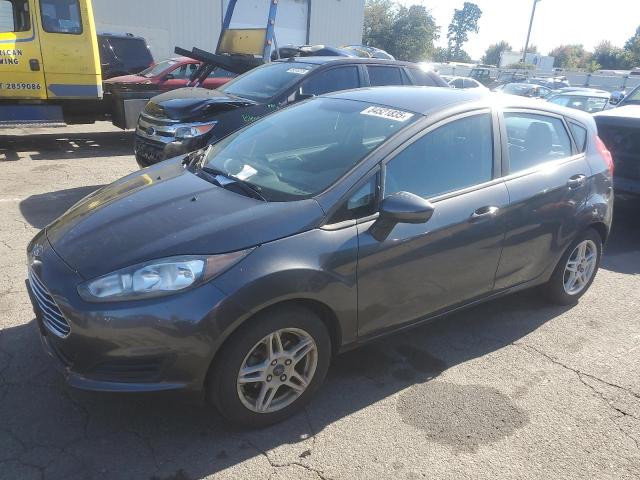 FORD FIESTA SE 2019 with VIN 3FADP4EJ0KM164134 - Photo from auction