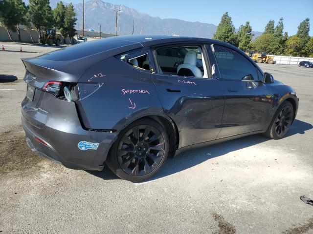 Photo 3 from auction – 2021 TESLA MODEL Y with VIN 5YJYGDEE0MF274414