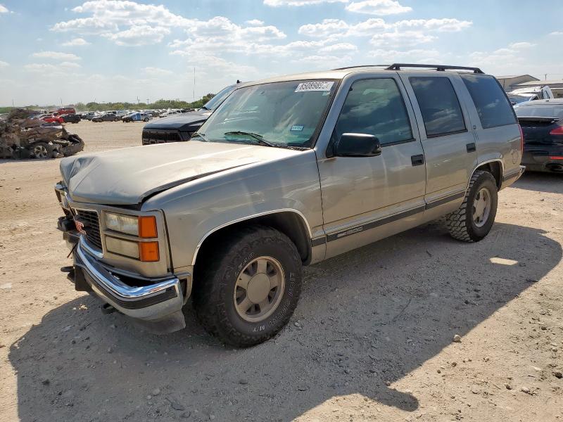 GMC YUKON 1998 with VIN 1GKEC13R8WJ735975 - Photo from auction