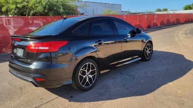 Photo 4 from auction – 2015 FORD FOCUS SE with VIN 1FADP3F28FL226923