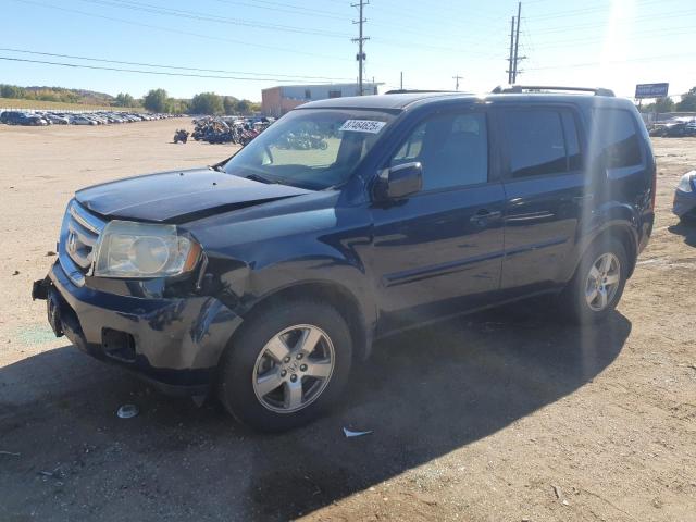 HONDA PILOT EXL 2011 with VIN 5FNYF4H51BB030587 - Photo from auction