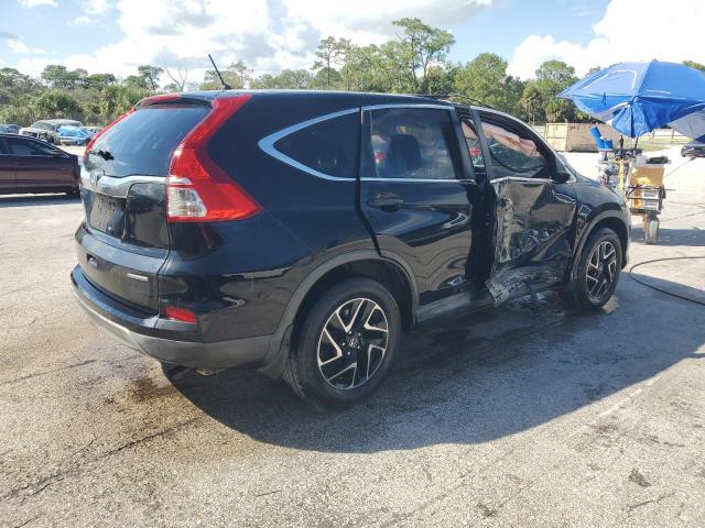 Photo 3 from auction – 2016 HONDA CR-V with VIN 2HKRM3H47GH530869