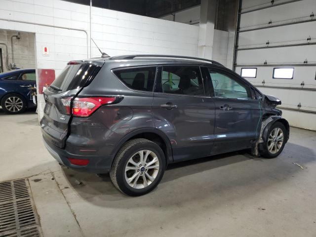 Photo 3 from auction – 2018 FORD ESCAPE SE with VIN 1FMCU9GD1JUC35348