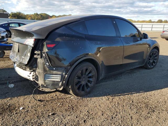 Photo 3 from auction – 2021 TESLA MODEL Y with VIN 5YJYGDEE7MF302578