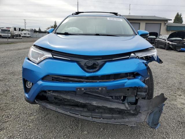 Photo 5 from auction – 2016 TOYOTA RAV4 XLE with VIN JTMRFREV5GJ060259