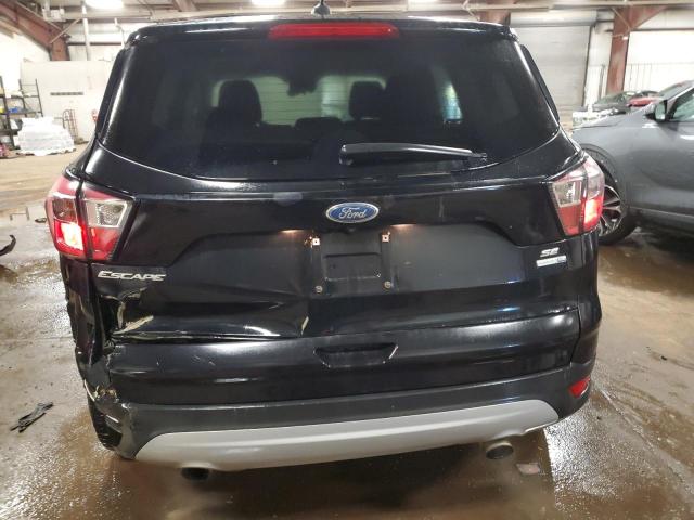 Photo 6 from auction – 2017 FORD ESCAPE SE with VIN 1FMCU9G95HUC81187