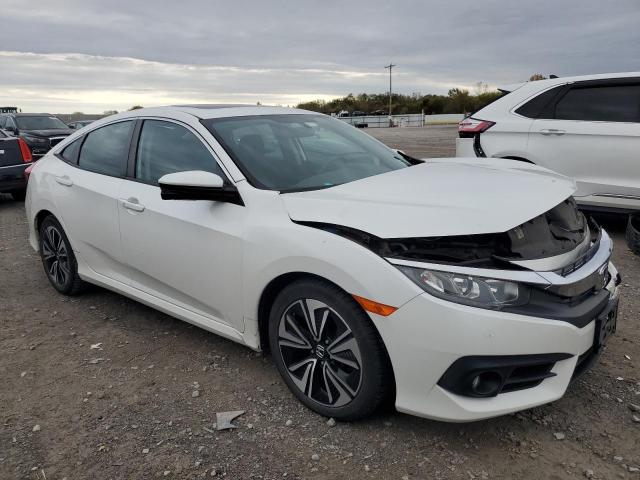 Photo 4 from auction – 2018 HONDA CIVIC EX with VIN 19XFC1F32JE201786
