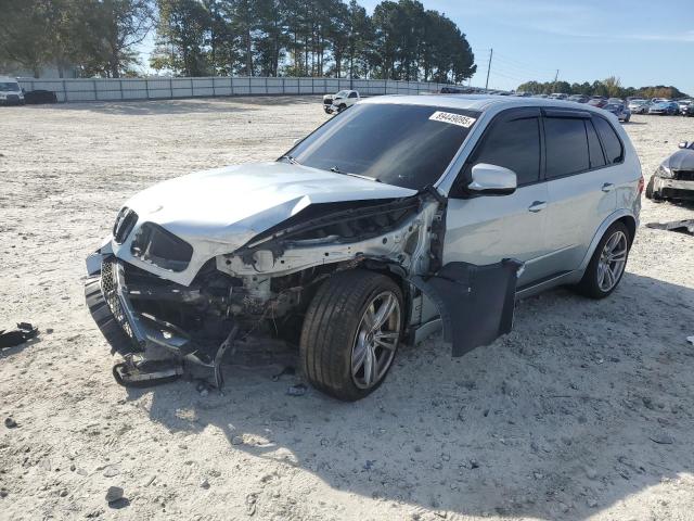 BMW X5 M 2011 with VIN 5YMGY0C54BLK26193 - Photo from auction