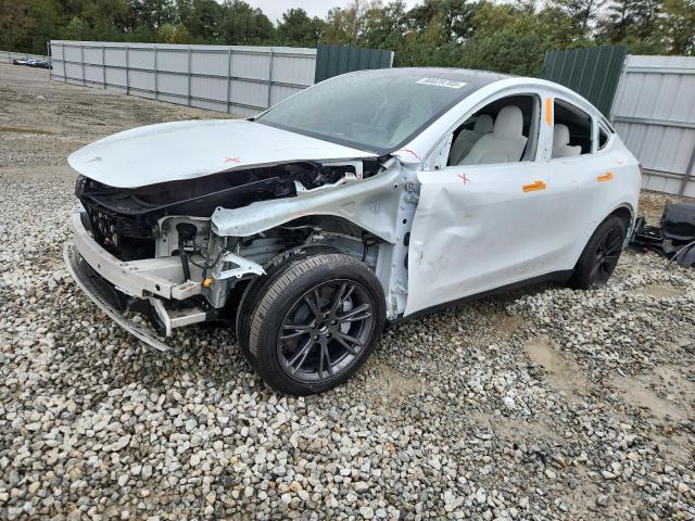 TESLA MODEL Y 2024 with VIN 7SAYGDED8RA320778 - Photo from auction