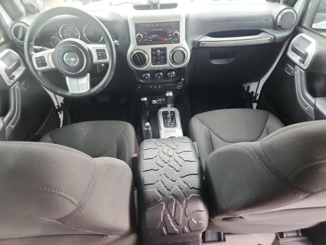 Photo 8 from auction – 2014 JEEP WRANGLER U with VIN 1C4BJWDG9EL288347