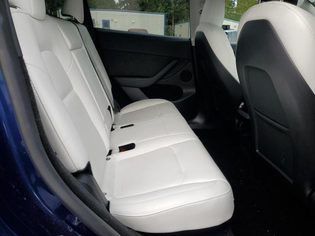 Photo 11 from auction – 2023 TESLA MODEL Y with VIN 7SAYGDEE3PF883665