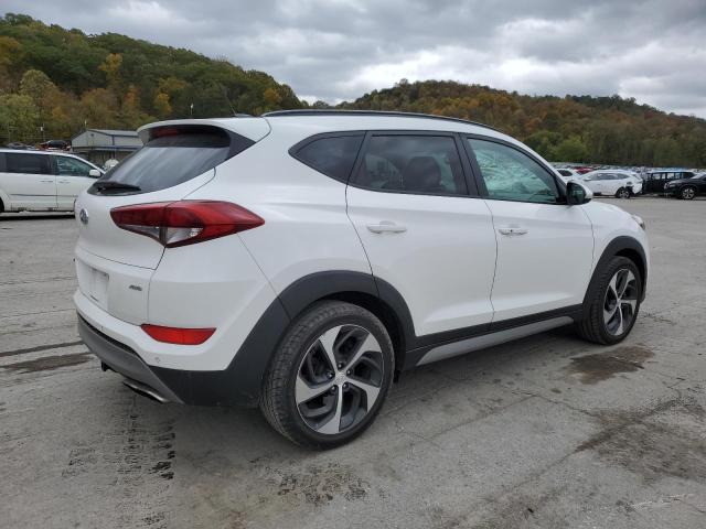 Photo 3 from auction – 2017 HYUNDAI TUCSON LIM with VIN KM8J3CA25HU580715