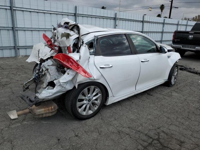 Photo 3 from auction – 2018 KIA OPTIMA with VIN 5XXGT4L32JG262976