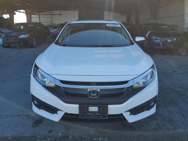 Photo 5 from auction – 2018 HONDA CIVIC EX with VIN JHMFC1F32JX026745