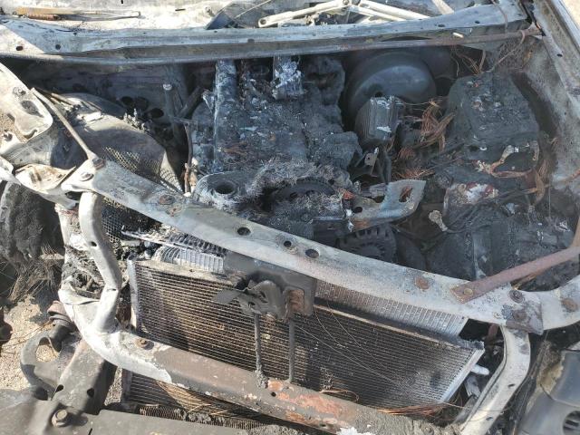 Photo 12 from auction – 2004 CHEVROLET TRAILBLAZE with VIN 1GNET16S246115026