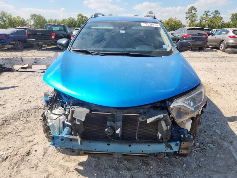 Photo 5 from auction – 2018 TOYOTA RAV4 LE with VIN JTMZFREV8JJ192178